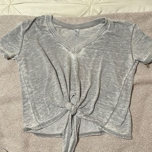 Grey shirt with tie at bottom